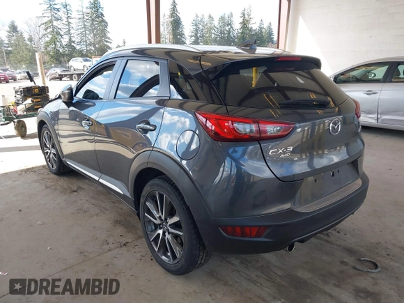 2017 Mazda CX-3 Grand Touring z VIN JM1DKFD70H0150496, wystawiony jako IAAI lot #41746038 z przebiegiem 108 091 mil mil oraz . Historia ofert i sprzedaży dostępna na DreamBid. Obrazek 3.