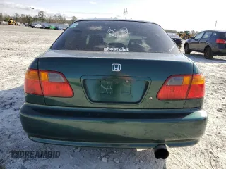 1999 Honda Civic VP z VIN 2HGEJ6617XH527272, wystawiony jako Copart lot #49640465 z przebiegiem 278 909 mil mil oraz Szkoda całkowita • Salvage title. Historia ofert i sprzedaży dostępna na DreamBid. Obrazek 6.