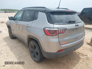 2018 Jeep Compass Latitude with VIN 3C4NJCBBXJT494116, listed as a IAAI auction lot 42150992 with 96,125 mi miles and . Bid and sale history available at DreamBid. Image 3.