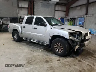 2007 Mitsubishi Raider LS z VIN 1Z7HT28KX7S216386, wystawiony jako Copart lot #88034315 z przebiegiem 162 337 mil mil oraz Czysty tytuł • Clean title. Historia ofert i sprzedaży dostępna na DreamBid. Obrazek 4.