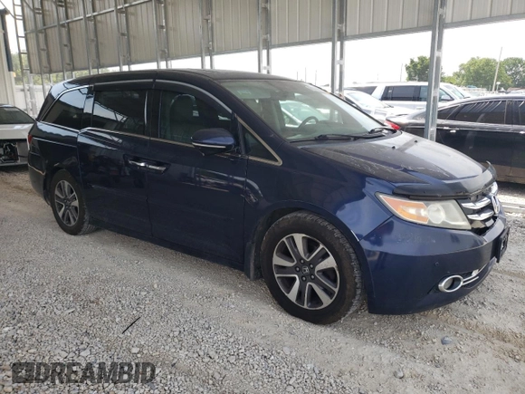2014 Honda Odyssey Touring with VIN 5FNRL5H92EB072034, listed as a Copart auction lot 60371485 with 259,312 mi miles and Clean title. Bid and sale history available at DreamBid. Image 4.