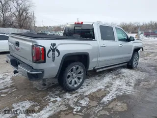2018 GMC Sierra 1500 Denali with VIN 3GTU2PEJXJG472435, listed as a IAAI auction lot 41376821 with 63,177 mi miles. Bid and sale history available at carsss.com. Image 4.