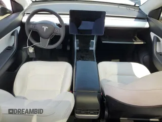 2020 Tesla Model Y Long Range with VIN 5YJYGDEE6LF051549, listed as a Copart auction lot 55063805 with 77,861 mi miles and Salvage Title. Bid and sale history available at DreamBid. Image 8.