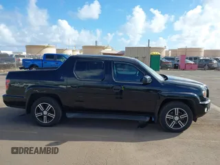 2013 Honda Ridgeline Sport with VIN 5FPYK1F70DB011814, listed as a IAAI auction lot 41689579 with 136,251 mi miles and . Bid and sale history available at DreamBid. Image 13.