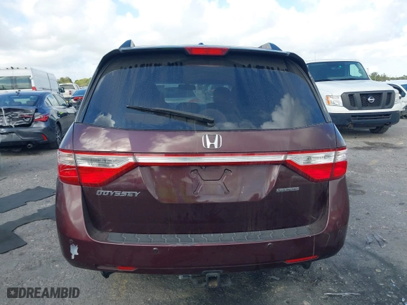 2011 Honda Odyssey Touring with VIN 5FNRL5H97BB008759, listed as a IAAI auction lot 41567010 with 215,709 mi miles. Bid and sale history available at carsss.com. Image 16.