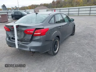 2016 Ford Focus SE with VIN 1FADP3F2XGL280855, listed as a IAAI auction lot 40380378 with 173,877 mi miles and . Bid and sale history available at carsss.com. Image 4.