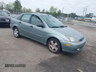 2004 Ford Focus ZTS with VIN 1FAFP38Z74W117402, listed as a IAAI auction lot 42035928 with 113,393 mi miles and . Bid and sale history available at carsss.com. Image 1.