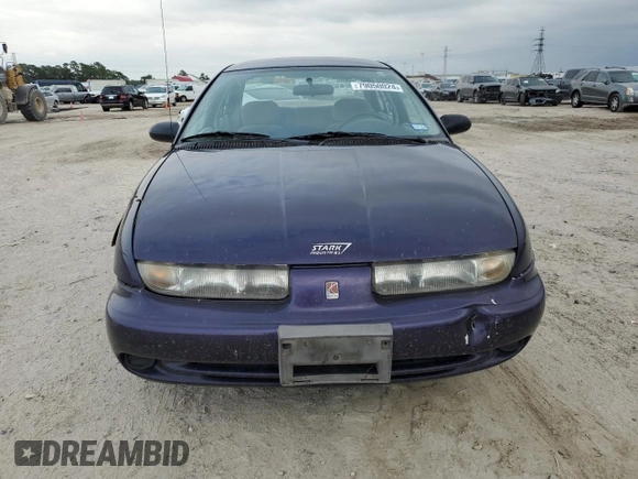 1996 Saturn SL with VIN 1G8ZK5278TZ255742, listed as a Copart auction lot 79050024 with 83,205 mi miles and Salvage title. Bid and sale history available at DreamBid. Image 5.