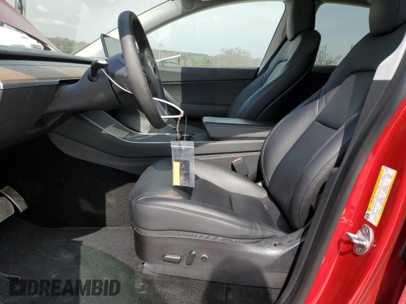 2021 Tesla Model Y Standard Range with VIN 5YJYGDED3MF107259, listed as a Copart auction lot 48566935 with 68,561 mi miles and Salvage Title. Bid and sale history available at carsss.com. Image 7.
