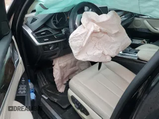 2014 BMW X5 xDrive35i z VIN 5UXKR0C59E0H23070, wystawiony jako Copart lot #55814815 z przebiegiem 113 895 mil mil oraz Szkody całkowita. Historia ofert i sprzedaży dostępna na DreamBid. Obrazek 8.