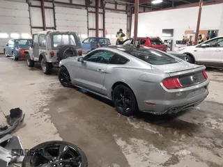 2021 Ford Mustang EcoBoost with VIN 1FA6P8TH1M5127800, listed as a IAAI auction lot 41625544 with 82,531 mi miles and . Bid and sale history available at carsss.com. Image 3.