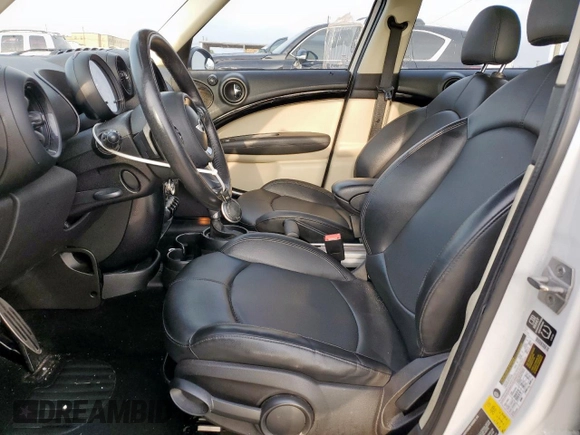 2014 MINI Countryman S with VIN WMWZC3C53EWT01161, listed as a Copart auction lot 50586965 with 151,813 mi miles and Salvage Title. Bid and sale history available at DreamBid. Image 7.