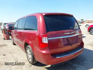 2013 Chrysler Town & Country Touring z VIN 2C4RC1BG7DR583239, wystawiony jako IAAI lot #41955325 z przebiegiem 183 880 mil mil oraz . Historia ofert i sprzedaży dostępna na DreamBid. Obrazek 3.