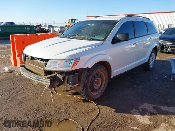 2017 Dodge Journey SE z VIN 3C4PDCAB3HT707029, wystawiony jako IAAI lot #41406306 z przebiegiem 104 046 mil mil oraz . Historia ofert i sprzedaży dostępna na DreamBid. Obrazek 2.