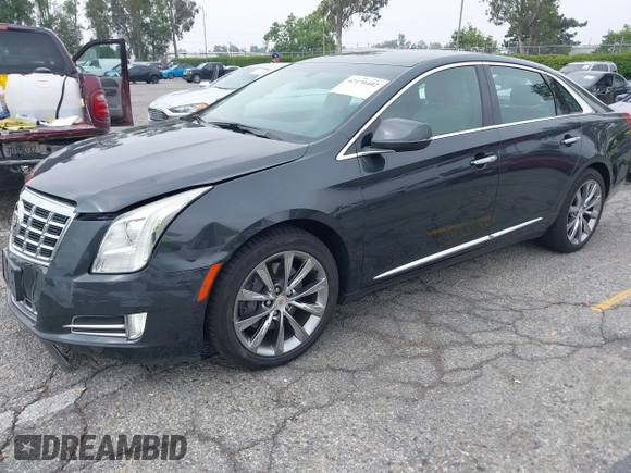 2013 Cadillac XTS Luxury with VIN 2G61P5S33D9215214, listed as a IAAI auction lot 42170402 with 132,045 mi miles and . Bid and sale history available at DreamBid. Image 17.