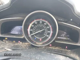 2015 Mazda 3 i Grand Touring z VIN JM1BM1M70F1234359, wystawiony jako IAAI lot #40858311 z przebiegiem 125 707 mil mil oraz . Historia ofert i sprzedaży dostępna na DreamBid. Obrazek 7.