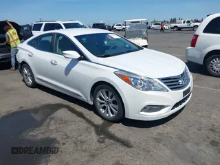 2013 Hyundai Azera with VIN KMHFG4JG5DA267347, listed as a IAAI auction lot 42580501 with 111,975 mi miles and . Bid and sale history available at DreamBid. Image 1.
