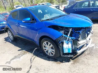 2020 Toyota C-HR LE with VIN JTNKHMBX7L1071287, listed as a IAAI auction lot 42063896 with 76,731 mi miles. Bid and sale history available at carsss.com. Image 1.