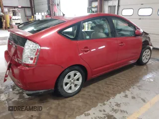 2007 Toyota Prius z VIN JTDKB20U973245003, wystawiony jako IAAI lot #42151888 z przebiegiem 251 212 mil mil oraz . Historia ofert i sprzedaży dostępna na DreamBid. Obrazek 4.