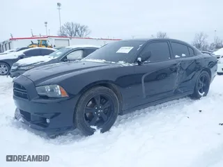 2014 Dodge Charger RT Plus with VIN 2C3CDXCT2EH134970, listed as a IAAI auction lot 41238430 with 148,066 mi miles. Bid and sale history available at carsss.com. Image 2.