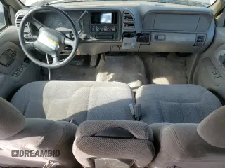 1999 GMC Yukon with VIN 1GKEK13R9XJ740395, listed as a Copart auction lot 83801394 with 185,305 mi miles and Salvage Title. Bid and sale history available at carsss.com. Image 8.