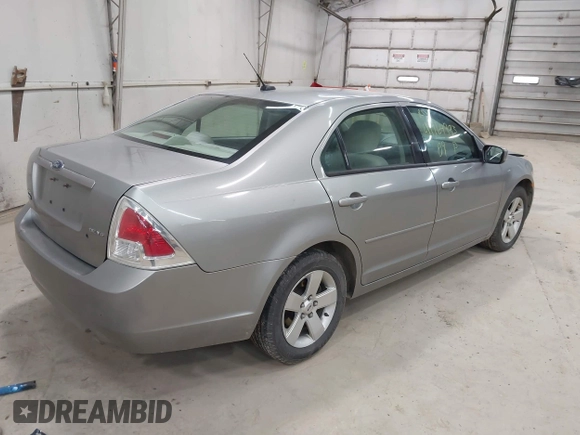 2009 Ford Fusion SE with VIN 3FAHP07159R106363, listed as a IAAI auction lot 41964993 with 167,361 mi miles. Bid and sale history available at carsss.com. Image 4.
