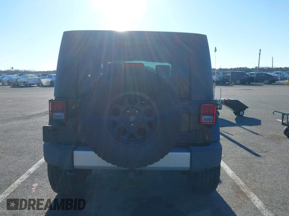 2010 Jeep Wrangler Unlimited Sahara with VIN 1J4HA5H16AL215659, listed as a IAAI auction lot 41749218 with 55,544 mi miles. Bid and sale history available at carsss.com. Image 16.
