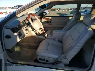 2002 Cadillac Eldorado z VIN 1G6EL12Y12B100821, wystawiony jako Copart lot #83495214 z przebiegiem 36 358 mil mil oraz Czysty tytuł • Clean title. Historia ofert i sprzedaży dostępna na DreamBid. Obrazek 7.