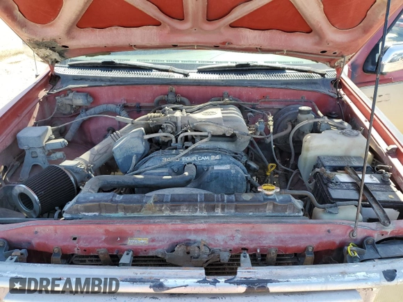 1995 Toyota T100 z VIN JT4VD22F0S0010554, wystawiony jako Copart lot #54718275 z przebiegiem 126 608 mil mil oraz Czysty tytuł • Clean title. Historia ofert i sprzedaży dostępna na DreamBid. Obrazek 11.