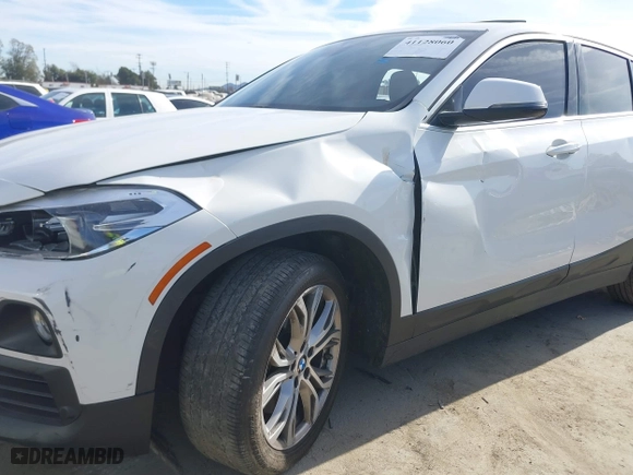 2020 BMW X2 sDrive28i with VIN WBXYH9C01L5P15004, listed as a IAAI auction lot 41128060 with 86,052 mi miles. Bid and sale history available at carsss.com. Image 6.