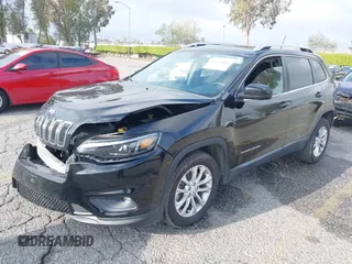 2019 Jeep Cherokee Latitude with VIN 1C4PJLCB8KD215423, listed as a IAAI auction lot 41911882 with 76,965 mi miles. Bid and sale history available at carsss.com. Image 2.