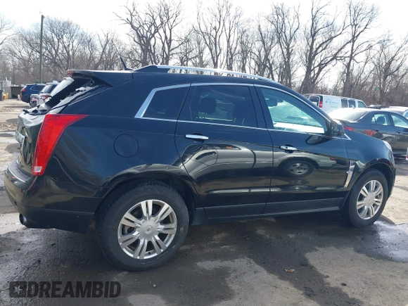 2011 Cadillac SRX Luxury Collection z VIN 3GYFNDEY9BS611653, wystawiony jako IAAI lot #41811912 z przebiegiem 144 689 mil mil oraz . Historia ofert i sprzedaży dostępna na DreamBid. Obrazek 13.