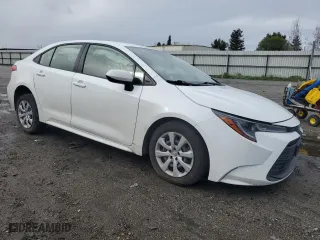 2023 Toyota Corolla LE with VIN JTDB4MEE4P3009298, listed as a Copart auction lot 48905545 with 19,807 mi miles and Salvage Title. Bid and sale history available at carsss.com. Image 4.