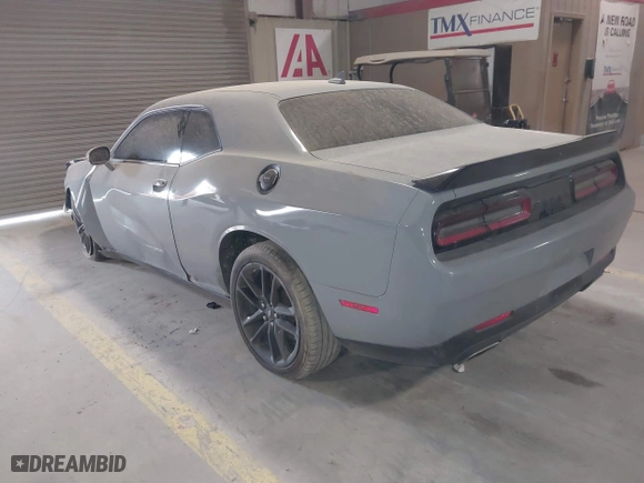 2021 Dodge Challenger GT with VIN 2C3CDZKG6MH642079, listed as a IAAI auction lot 41612713 with 76,863 mi miles. Bid and sale history available at carsss.com. Image 3.