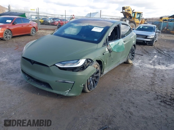 2022 Tesla Model X Plaid z VIN 7SAXCBE6XNF358023, wystawiony jako IAAI lot #41683857 z przebiegiem 42 821 mil mil oraz . Historia ofert i sprzedaży dostępna na DreamBid. Obrazek 2.