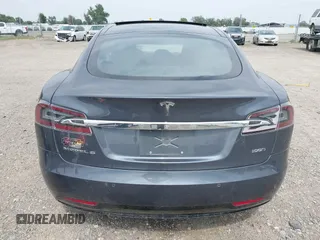 2019 Tesla Model S 75D with VIN 5YJSA1E22KF300407, listed as a IAAI auction lot 40034839 with 59,178 mi miles and . Bid and sale history available at DreamBid. Image 15.