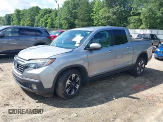 2020 Honda Ridgeline RTL with VIN 5FPYK3F5XLB025857, listed as a IAAI auction lot 42307343 with 97,262 mi miles and . Bid and sale history available at DreamBid. Image 2.
