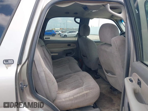 2002 Chevrolet Tahoe LS z VIN 1GNEC13V22R206341, wystawiony jako IAAI lot #42436560 z przebiegiem 271 904 mil mil oraz . Historia ofert i sprzedaży dostępna na DreamBid. Obrazek 8.
