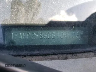 2016 Ford Taurus Limited z VIN 1FAHP2F86GG104703, wystawiony jako Copart lot #52086535 z przebiegiem Nie podano mil oraz Szkoda całkowita • Salvage title. Historia ofert i sprzedaży dostępna na DreamBid. Obrazek 12.