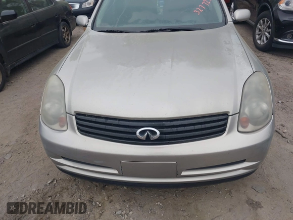 2003 Infiniti G35 with VIN JNKCV51E63M327729, listed as a IAAI auction lot 41970704 with 153,240 mi miles and . Bid and sale history available at DreamBid. Image 6.
