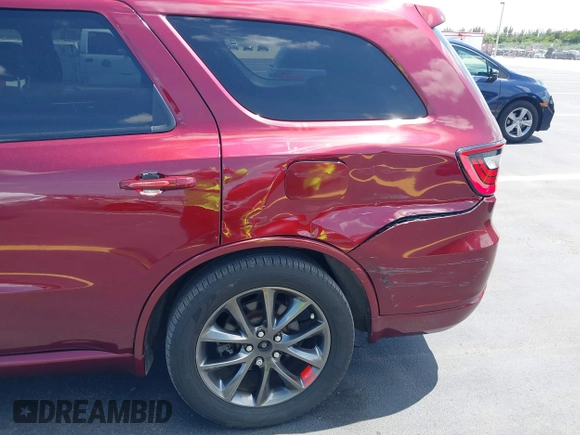 2018 Dodge Durango GT with VIN 1C4RDHDG5JC239657, listed as a IAAI auction lot 42203858 with 156,861 mi miles and . Bid and sale history available at DreamBid. Image 6.