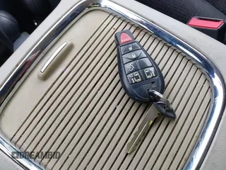2014 Dodge Grand Caravan SXT with VIN 2C4RDGCG4ER120877, listed as a IAAI auction lot 42142083 with 199,895 mi miles and . Bid and sale history available at DreamBid. Image 11.