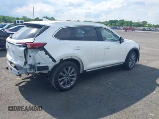 2021 Mazda CX-9 Grand Touring z VIN JM3TCBDY2M0541290, wystawiony jako IAAI lot #42216643 z przebiegiem 38 661 mil mil oraz . Historia ofert i sprzedaży dostępna na DreamBid. Obrazek 4.