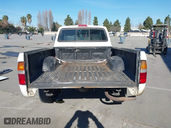 1998 Toyota Tacoma with VIN 4TANL42NXWZ117050, listed as a IAAI auction lot 41872096 with 333,863 mi miles. Bid and sale history available at carsss.com. Image 17.