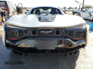 2023 McLaren Artura z VIN SBM16AEA4PW001953, wystawiony jako Copart lot #80270564 z przebiegiem 5956 mil mil oraz Nie do naprawy. Historia ofert i sprzedaży dostępna na DreamBid. Obrazek 6.