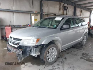 2014 Dodge Journey SE with VIN 3C4PDCAB1ET194066, listed as a IAAI auction lot 42117527 with 184,490 mi miles and . Bid and sale history available at carsss.com. Image 2.