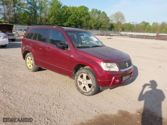 2006 Suzuki Grand Vitara Luxury with VIN JS3TD947564104838, listed as a IAAI auction lot 42082783 with 122,912 mi miles. Bid and sale history available at carsss.com. Image 1.
