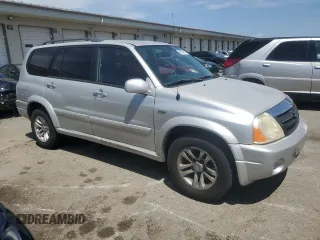 2004 Suzuki XL7 LX z VIN JS3TX92V644109794, wystawiony jako Copart lot #68244184 z przebiegiem 107 769 mil mil oraz Szkoda całkowita • Salvage title. Historia ofert i sprzedaży dostępna na DreamBid. Obrazek 4.