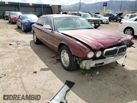 1998 Jaguar XJ Vanden Plas with VIN SAJKX6245WC830912, listed as a Copart auction lot 49717285 with 127,509 mi miles and Salvage Title. Bid and sale history available at DreamBid. Image 10.