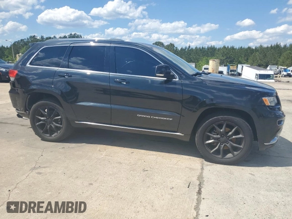2015 Jeep Grand Cherokee Summit with VIN 1C4RJFJG6FC828922, listed as a Copart auction lot 54878415 with 125,781 mi miles and Salvage title. Bid and sale history available at DreamBid. Image 4.